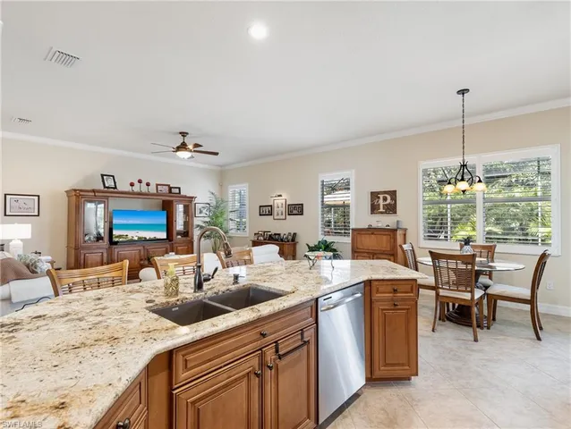 a view of a kitchen and dining room