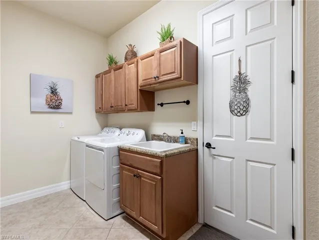 a view of utility room with washer and dryer