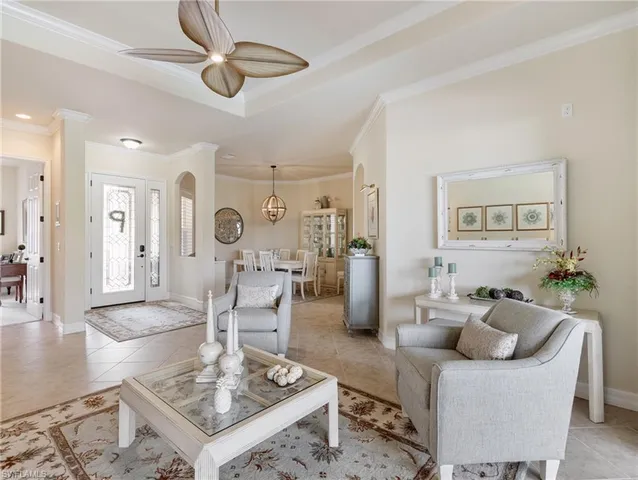 a living room with furniture and a table