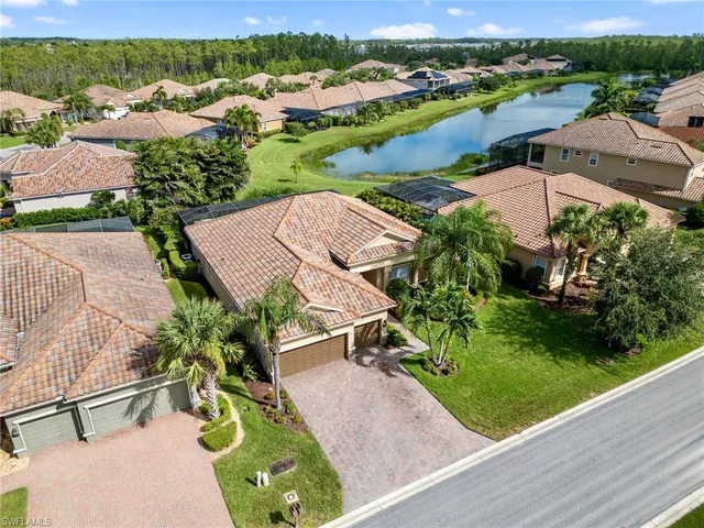 an aerial view of residential house with outdoor space