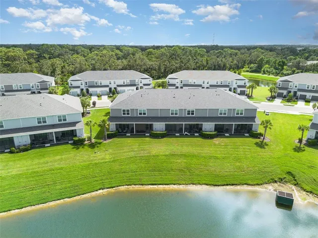 a view of a house with a big yard