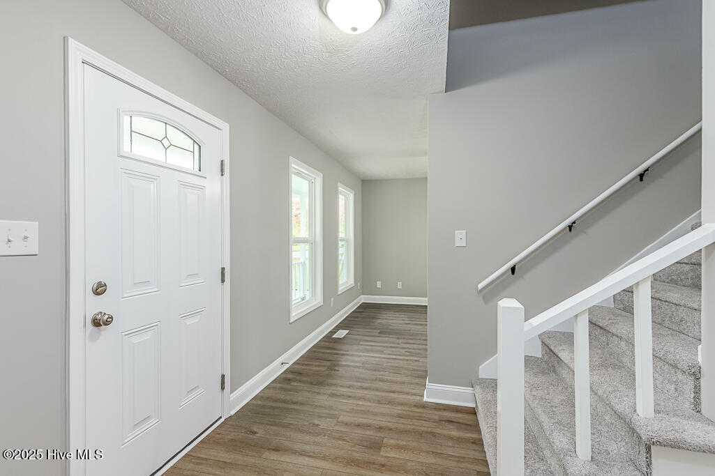 103 Quail Ridge Road Havelock, NC 28532 - Photo 4 of 24 Foyer with Stairs