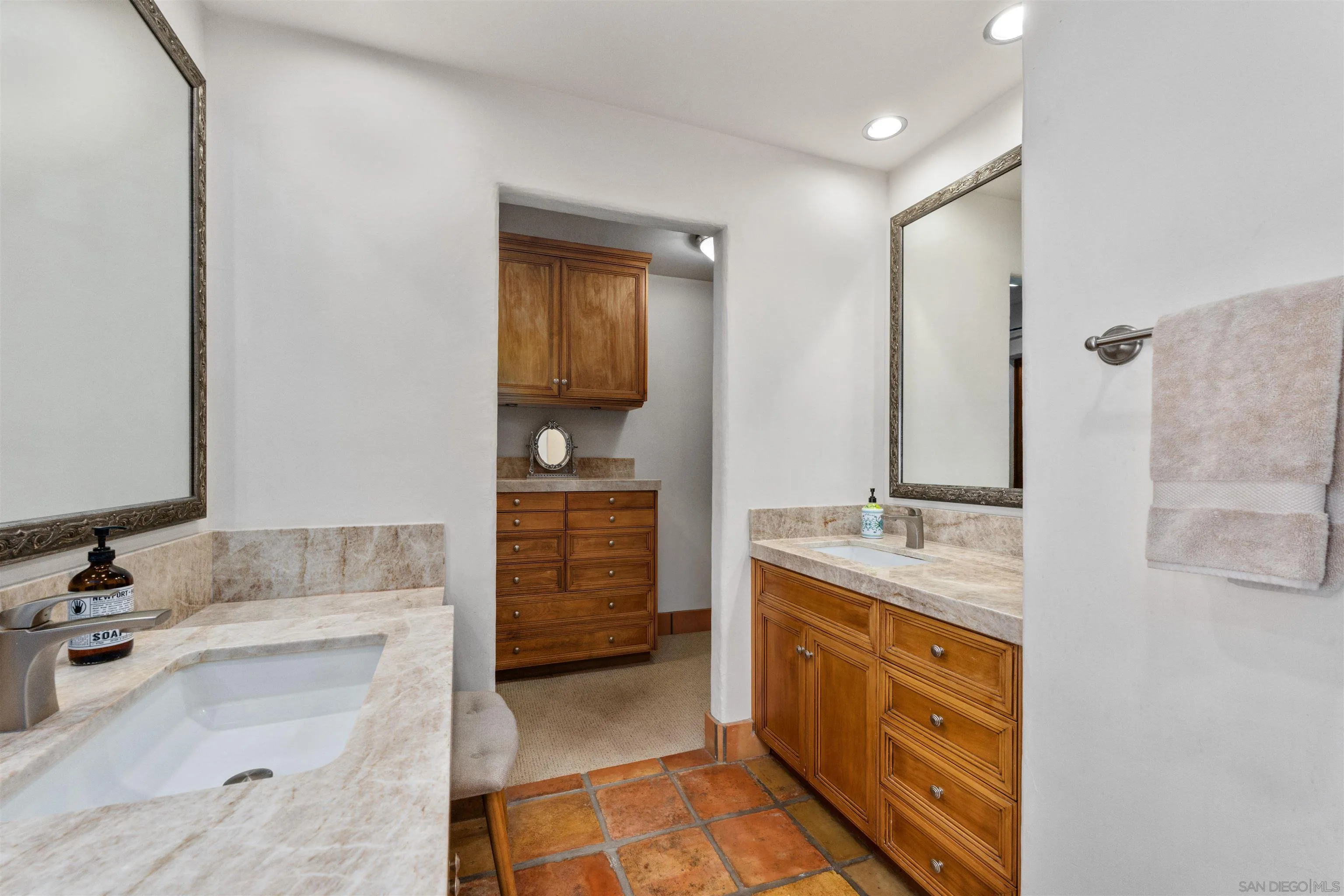 17156 Dos Hermanos Road Poway, CA 92064 - Photo 34 of 70 a bathroom with a tub sink and mirror