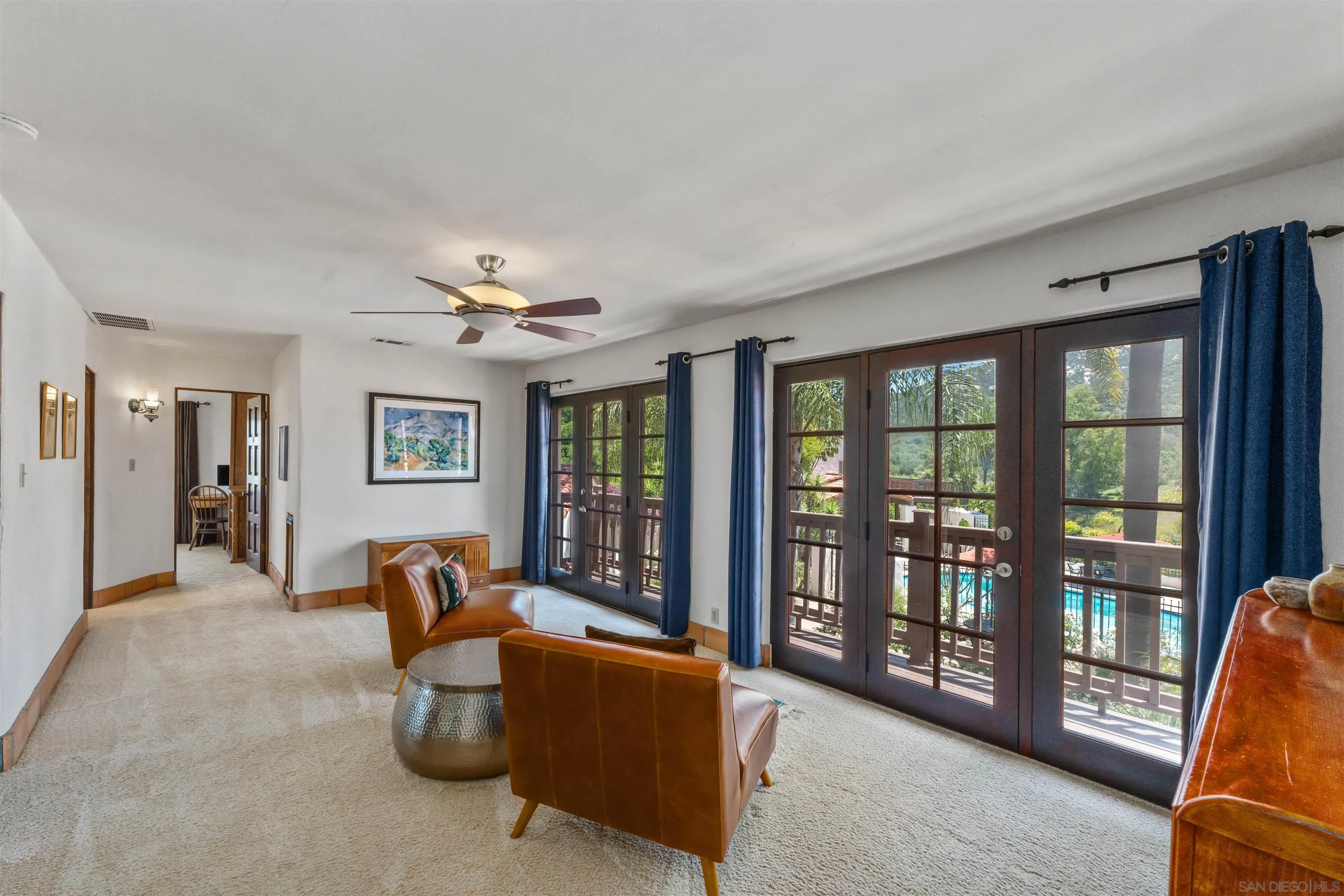 17156 Dos Hermanos Road Poway, CA 92064 - Photo 37 of 70 a living room with furniture and a large window