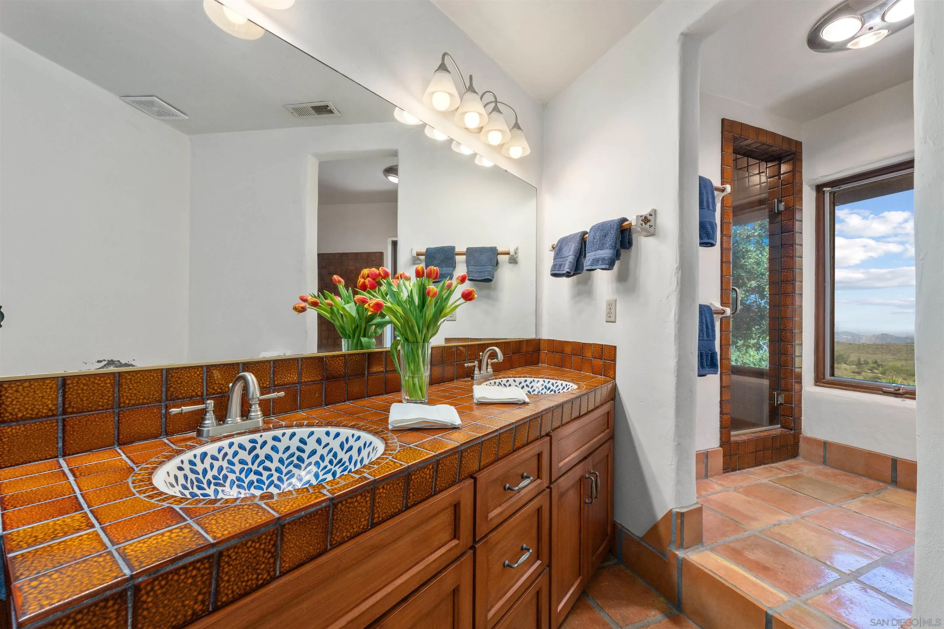 17156 Dos Hermanos Road Poway, CA 92064 - Photo 41 of 70 a dining room with furniture and a chandelier