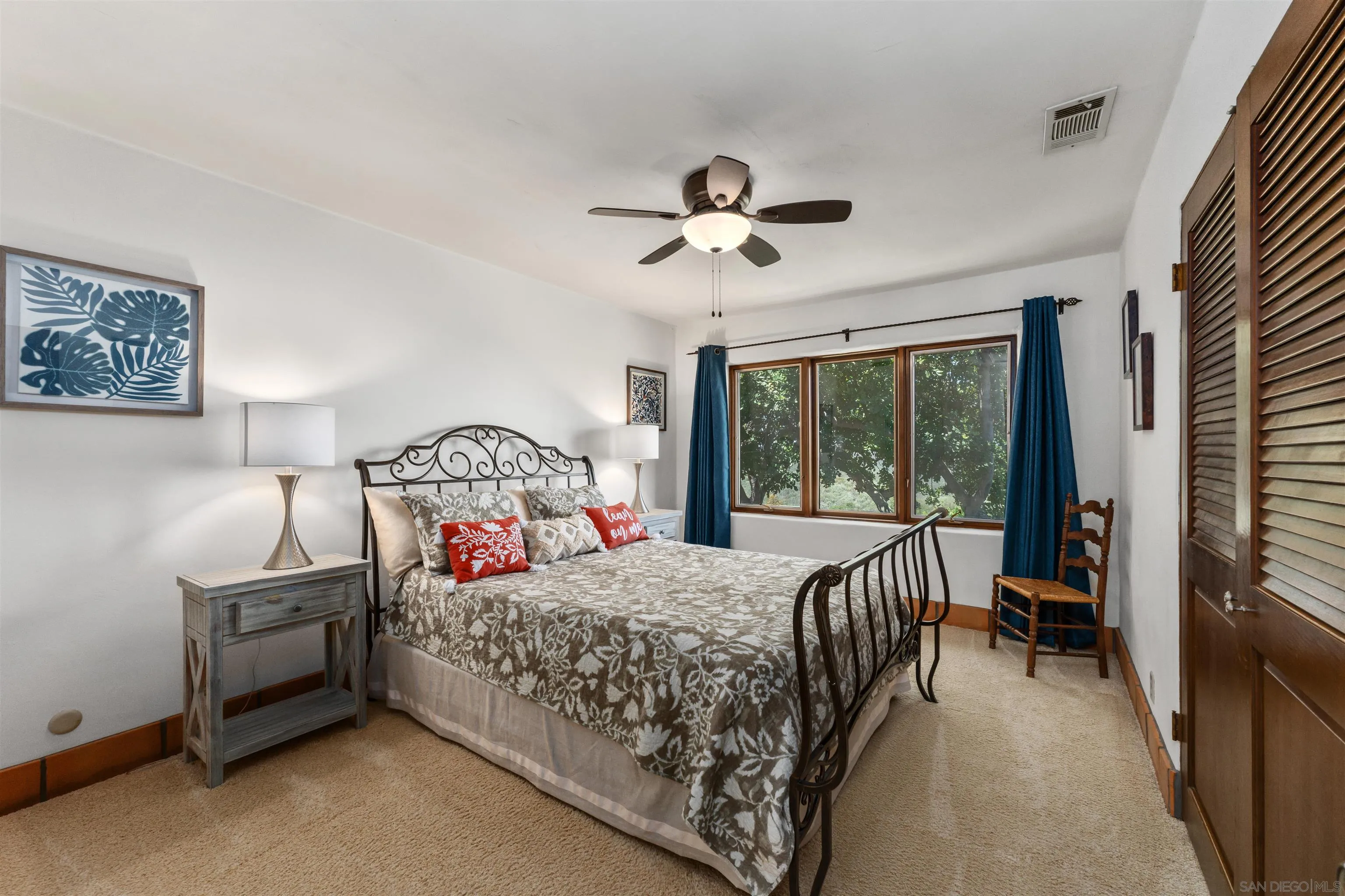 17156 Dos Hermanos Road Poway, CA 92064 - Photo 43 of 70 a bedroom with a bed and a large window