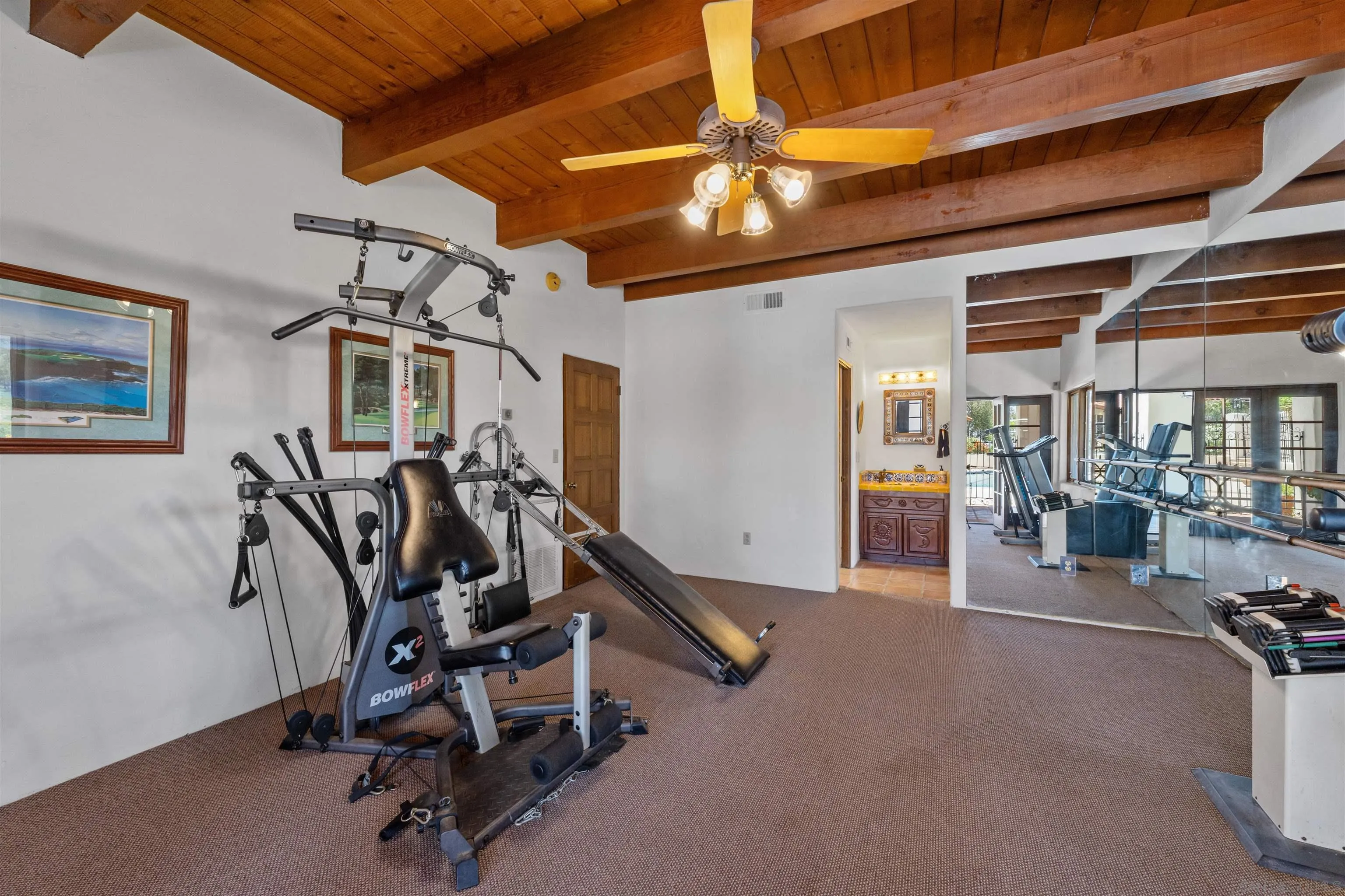 17156 Dos Hermanos Road Poway, CA 92064 - Photo 46 of 70 a view of a room with gym equipment