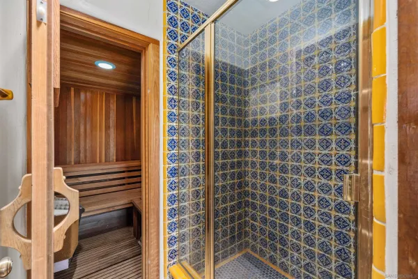 a view of a city with mountains in the background