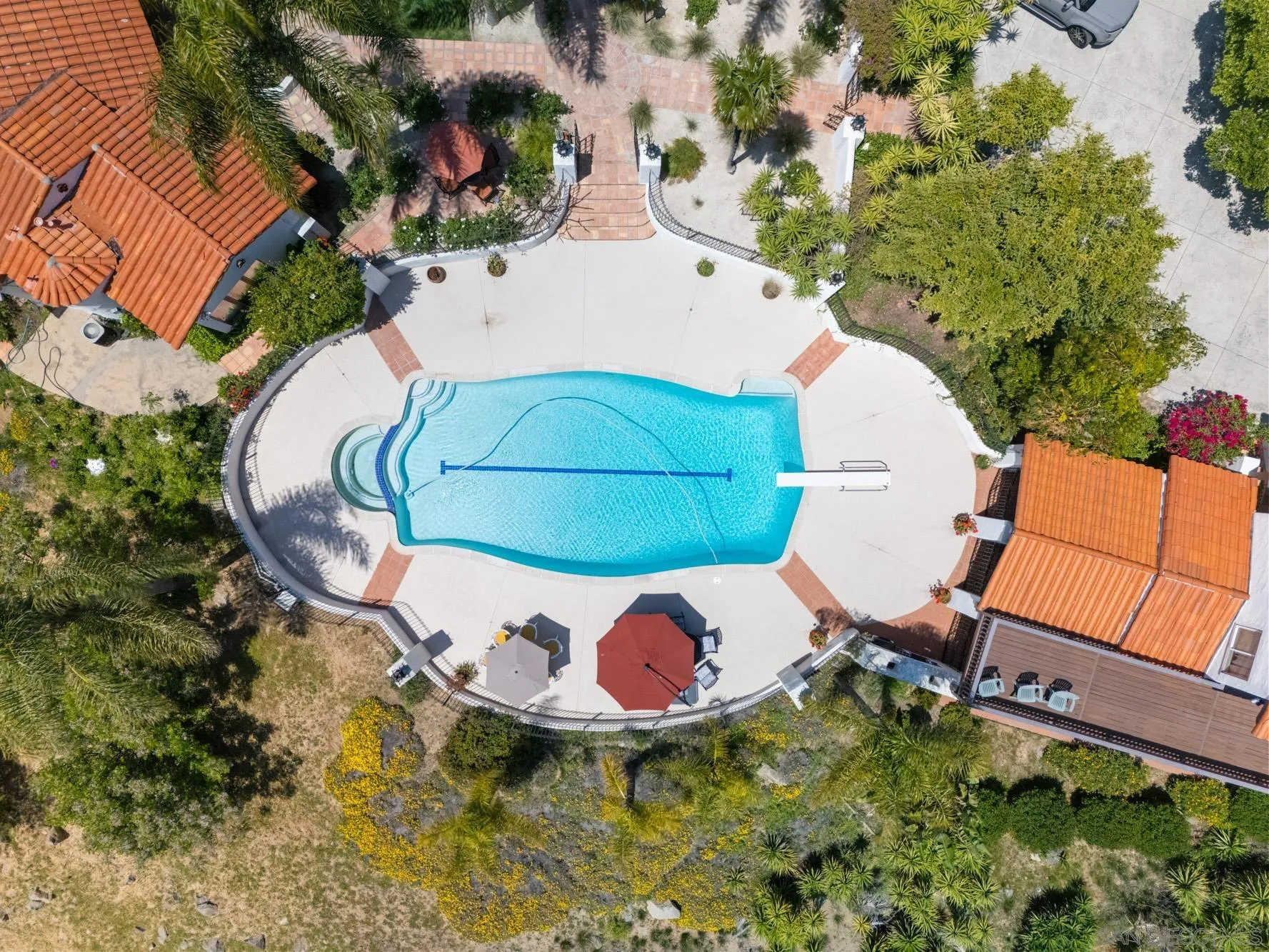17156 Dos Hermanos Road Poway, CA 92064 - Photo 66 of 70 an aerial view of a house with a swimming pool