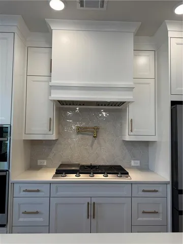 a view of kitchen with wooden floor