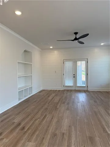 a bathroom with a shower and a glass door