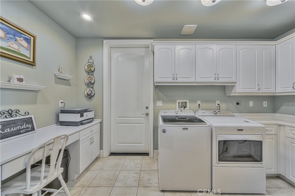 39700 Berenda Road Temecula, CA 92591 - Photo 24 of 71 a kitchen with stainless steel appliances granite countertop a stove and a refrigerator