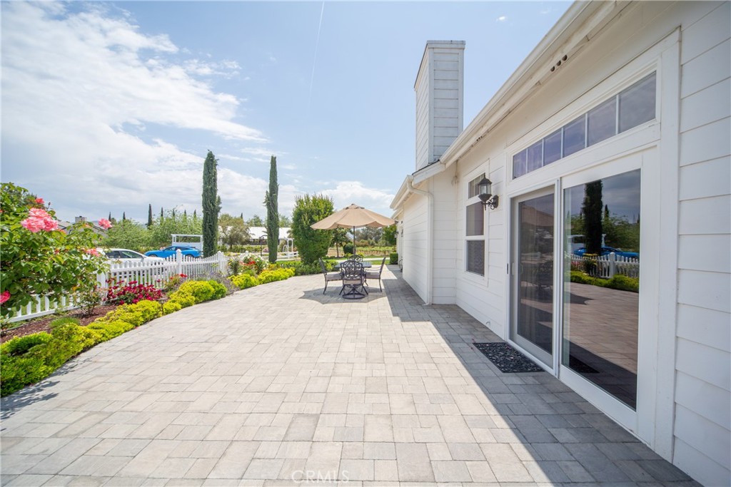 39700 Berenda Road Temecula, CA 92591 - Photo 39 of 71 a view of a patio with a table and chairs
