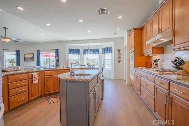 39700 Berenda Road Temecula, CA 92591 - Photo 52 of 71 STR guest house kitchen with island