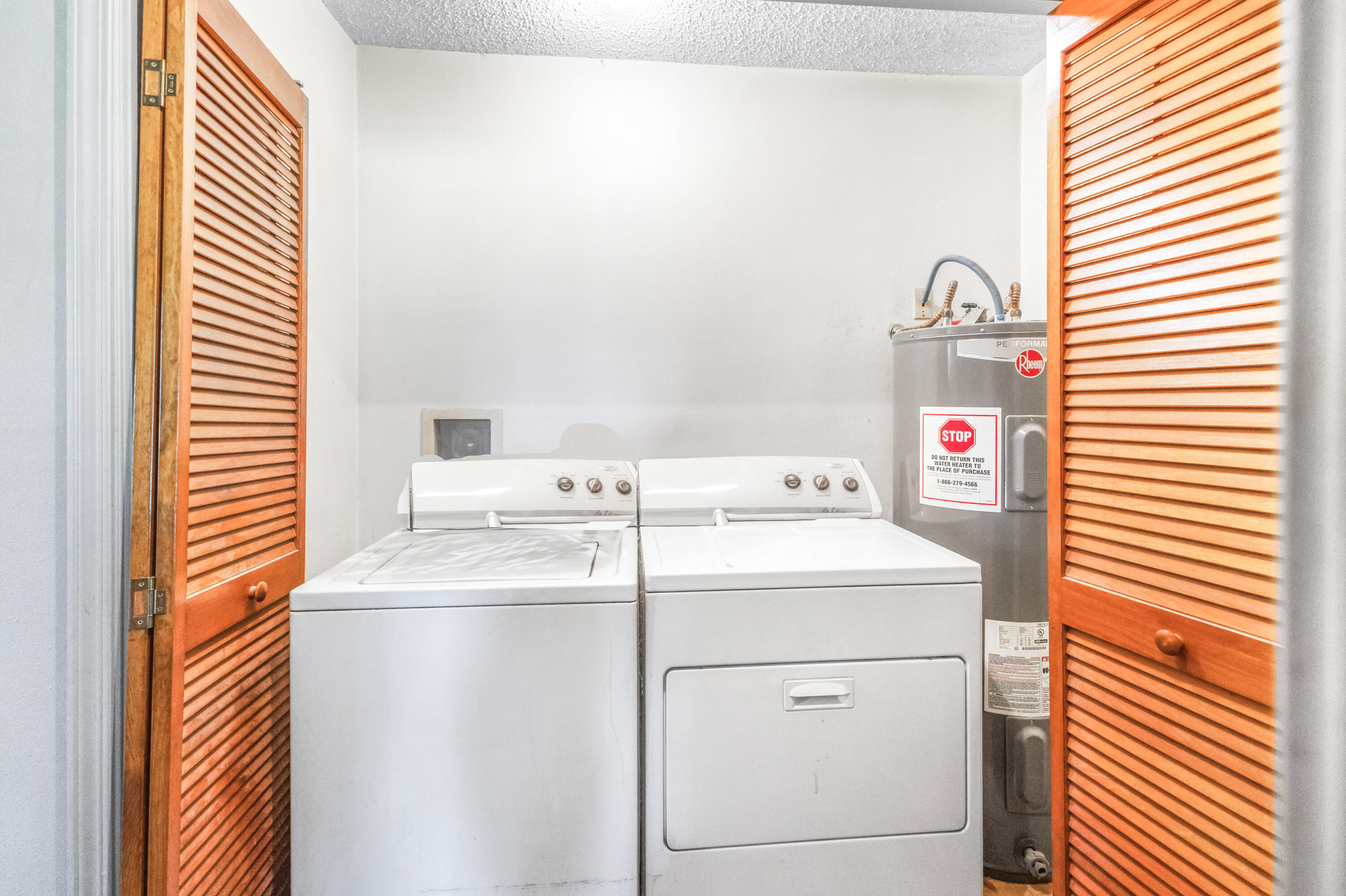 353 Florence Drive DeFuniak Springs, FL 32433 - Photo 10 of 16 a utility room with dryer and washer