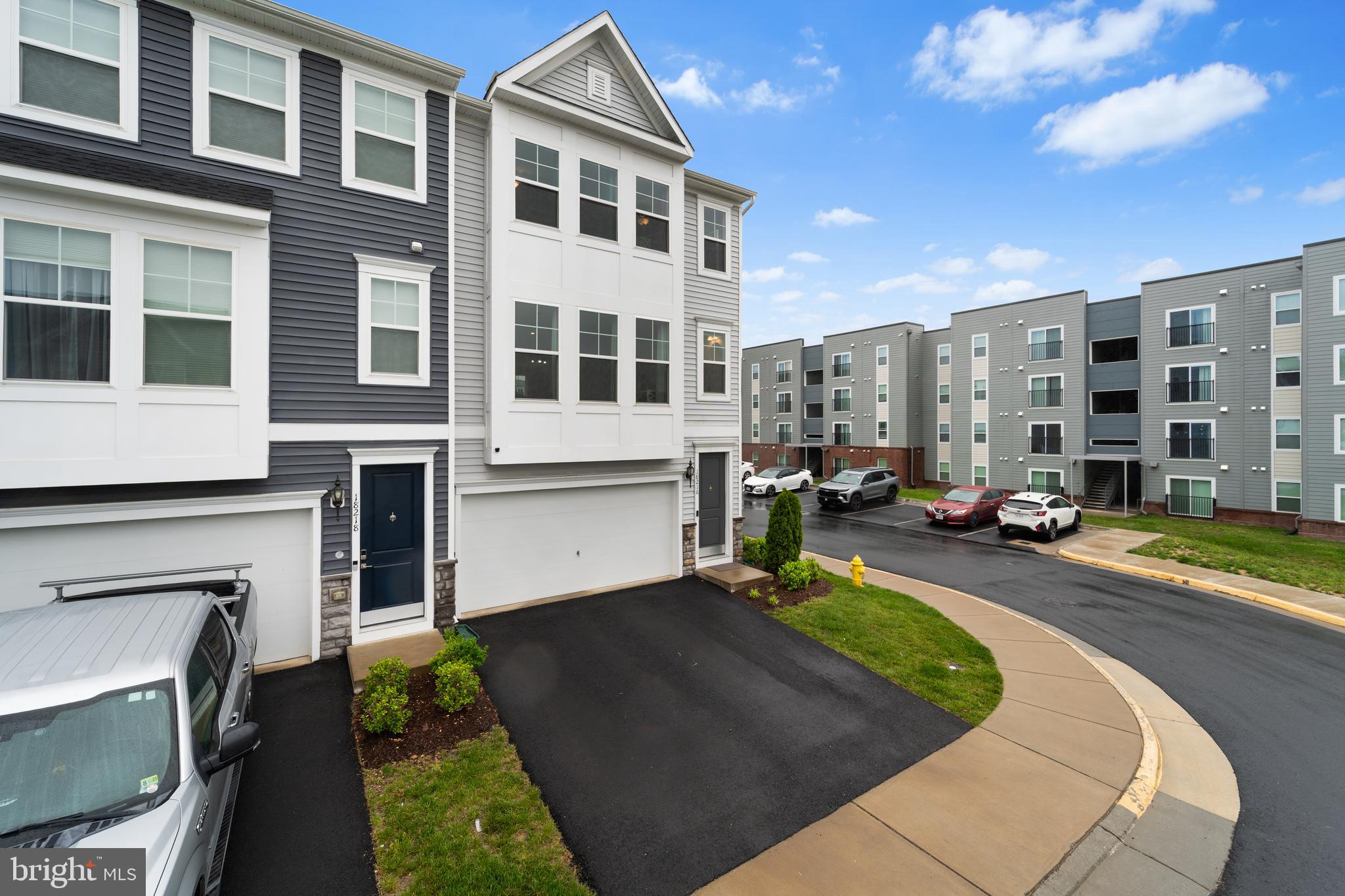 18216 Summit Pointe Drive Triangle, VA 22172 - Photo 2 of 25 a view of a building with sitting area