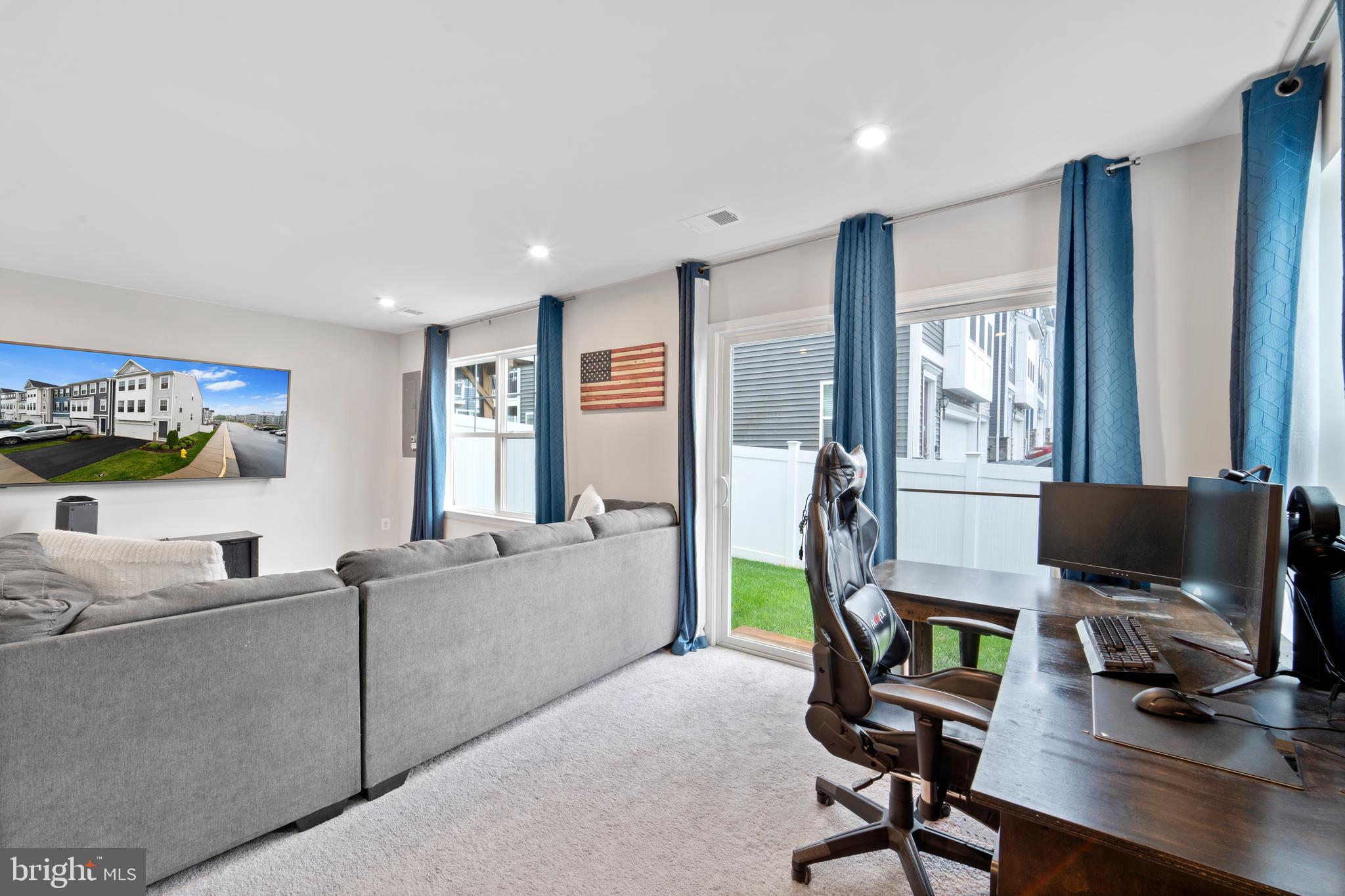 18216 Summit Pointe Drive Triangle, VA 22172 - Photo 21 of 25 a view of a livingroom with workspace and a window