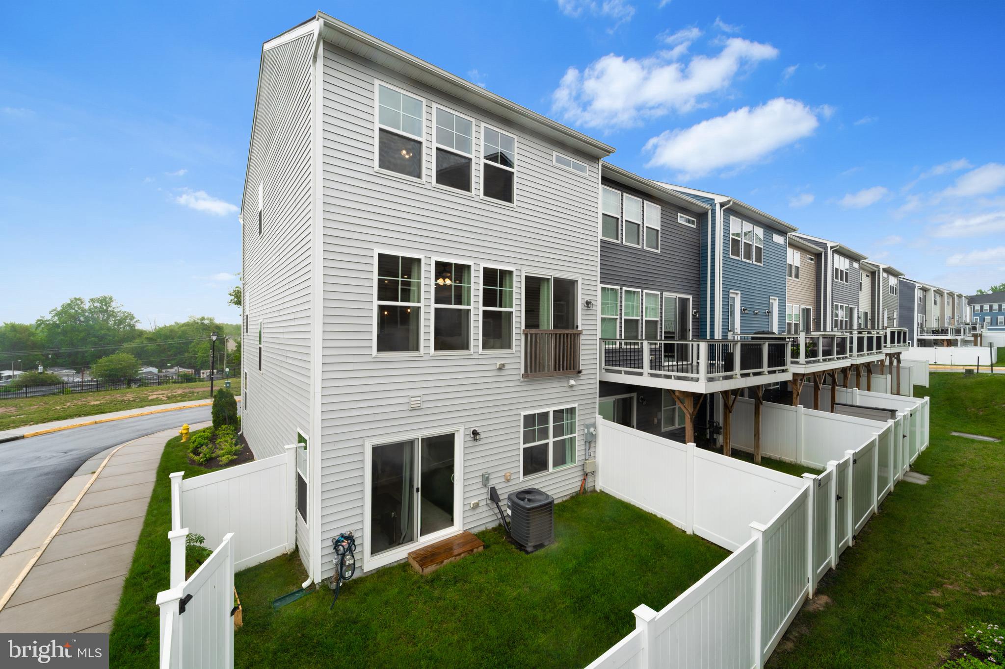 18216 Summit Pointe Drive Triangle, VA 22172 - Photo 25 of 25 a view of house with swimming pool and sitting area