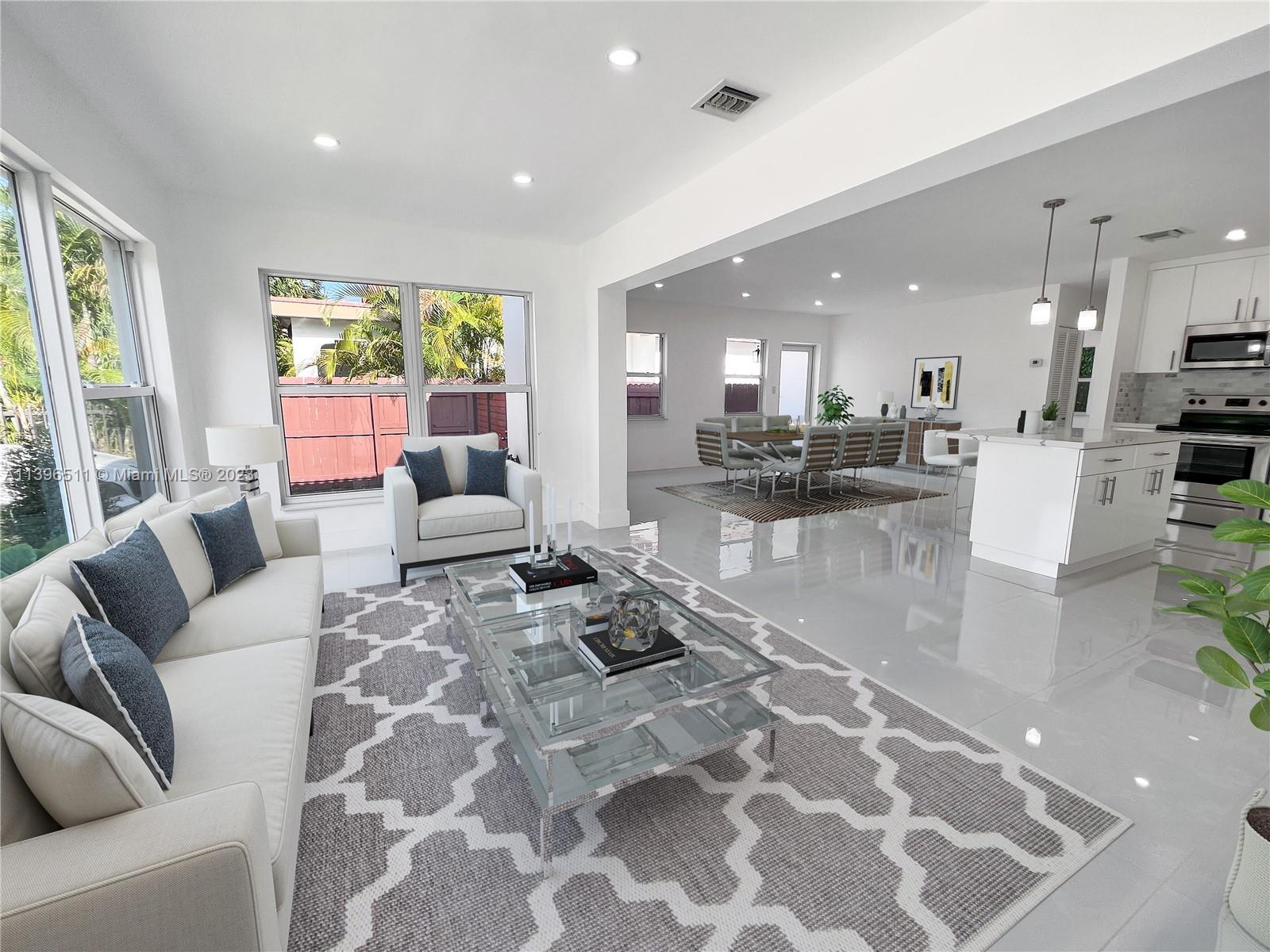 2180 Southwest 20th Street Miami, FL 33145 - Photo 12 of 31 a living room with furniture and a large window