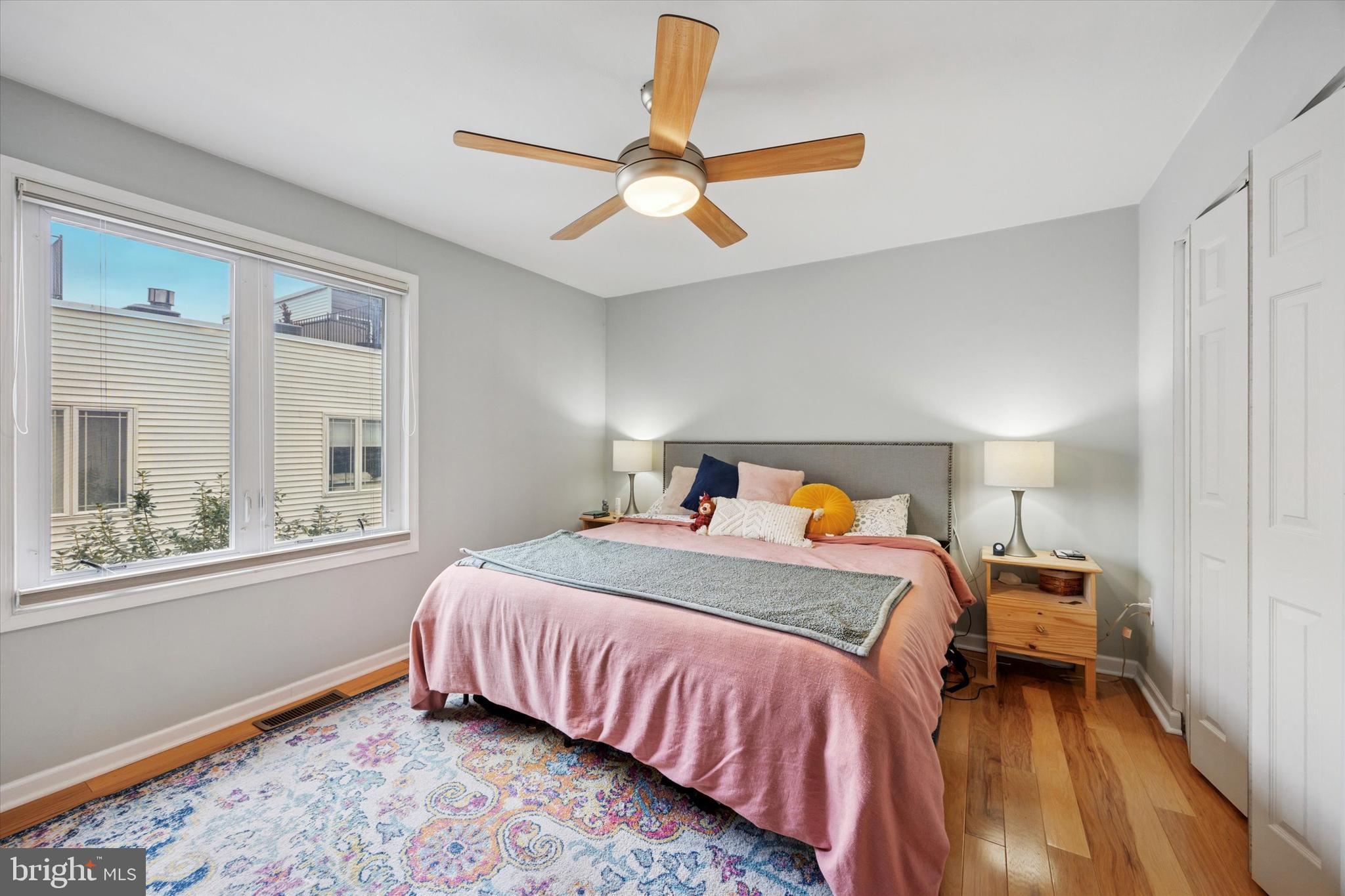 814 South Sheridan Street, Unit 2E Philadelphia, PA 19147 - Photo 17 of 24 a bedroom with a bed and a window