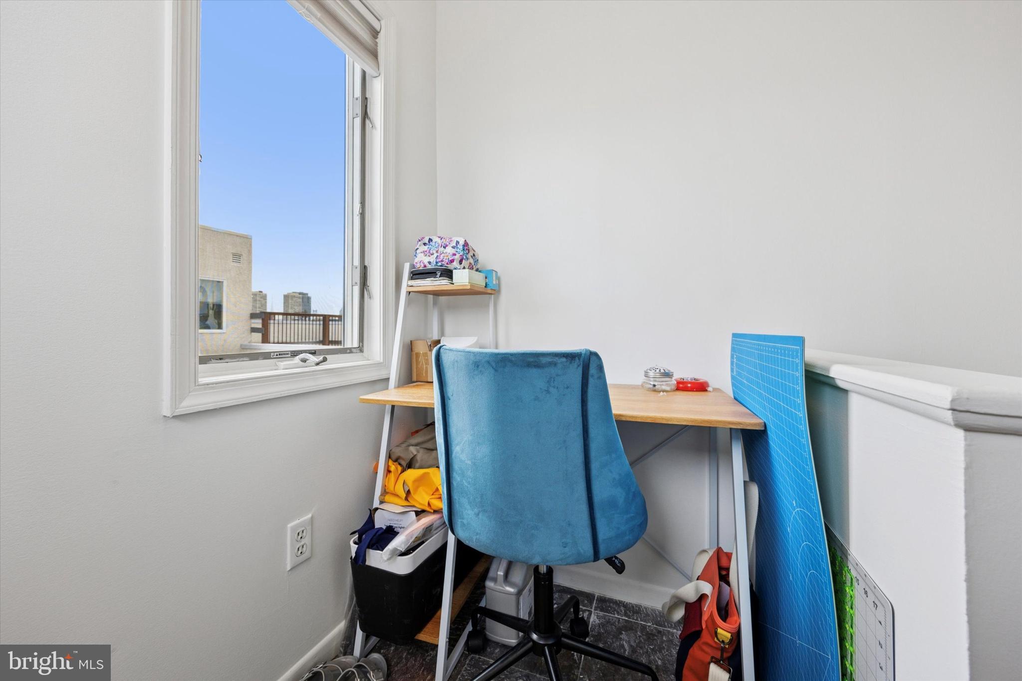 814 South Sheridan Street, Unit 2E Philadelphia, PA 19147 - Photo 18 of 24 a room with furniture and wooden floor