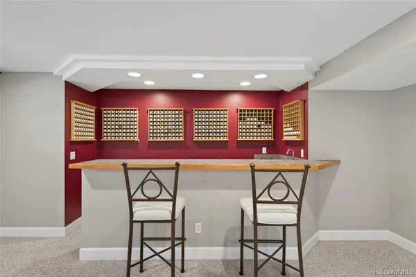 a view of a room with chairs and a table
