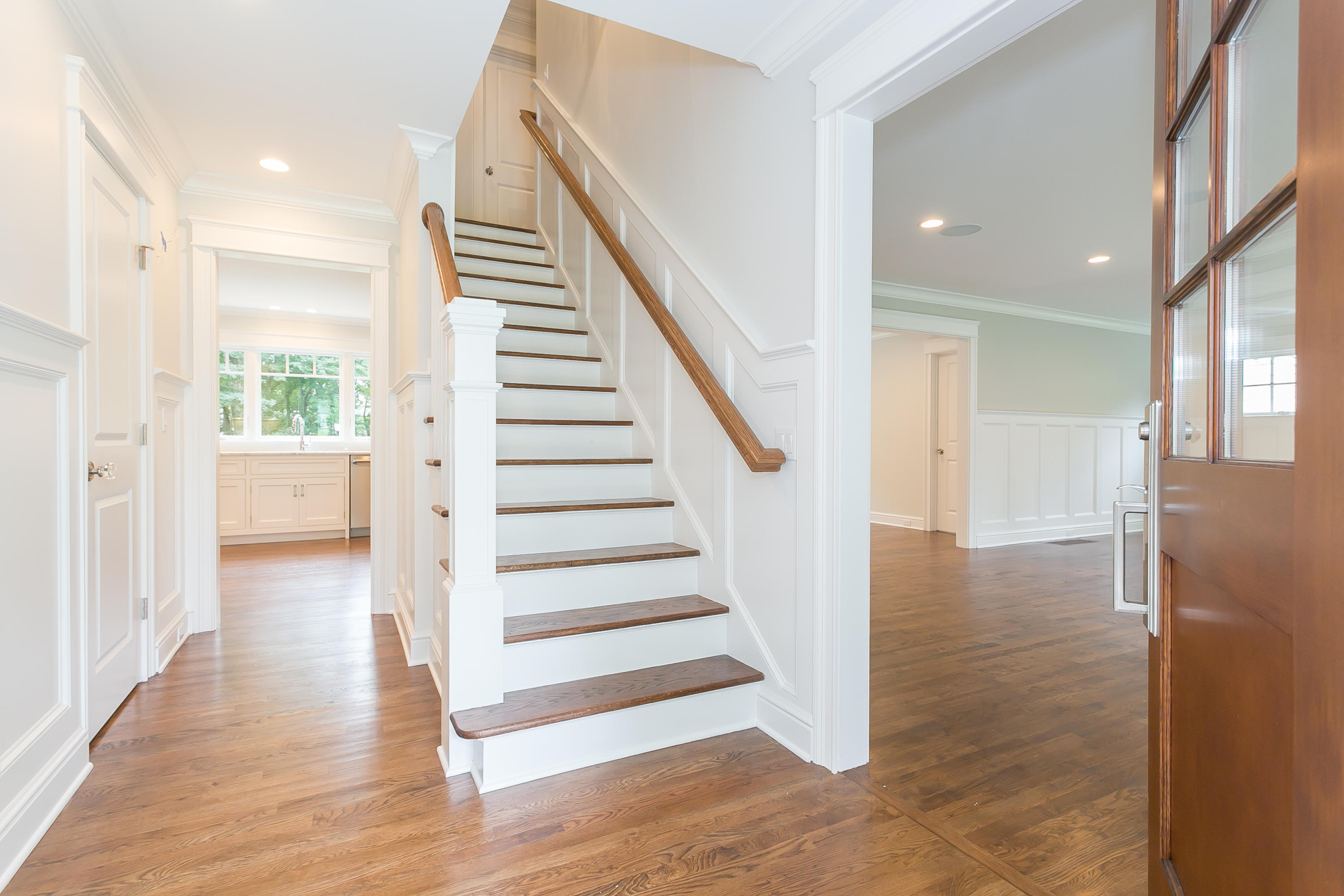 26 Country Club Road Darien, CT 06820 - Photo 21 of 42 a view of a hallway with wooden floor and entryway