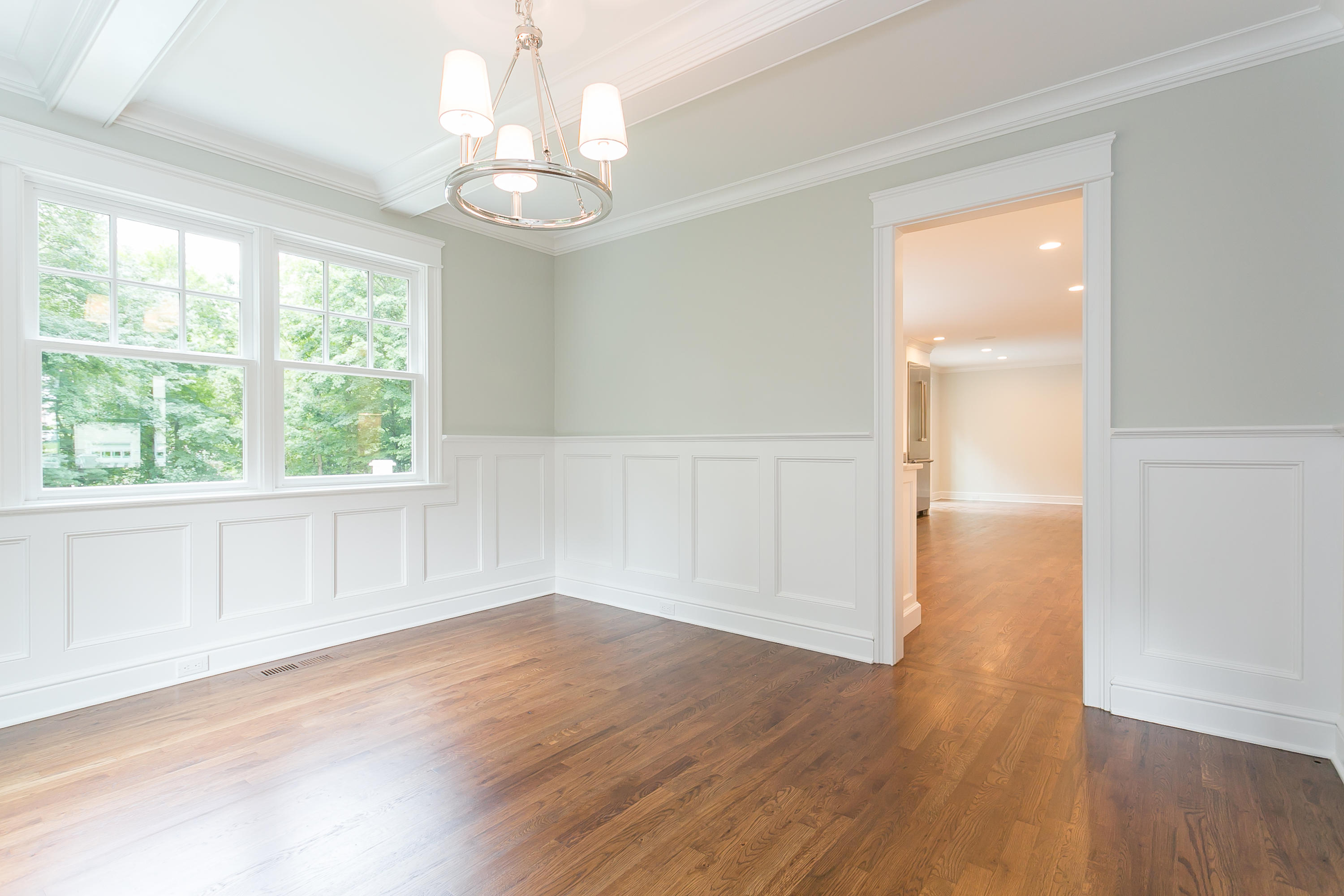 26 Country Club Road Darien, CT 06820 - Photo 26 of 42 an empty room with wooden floor and windows