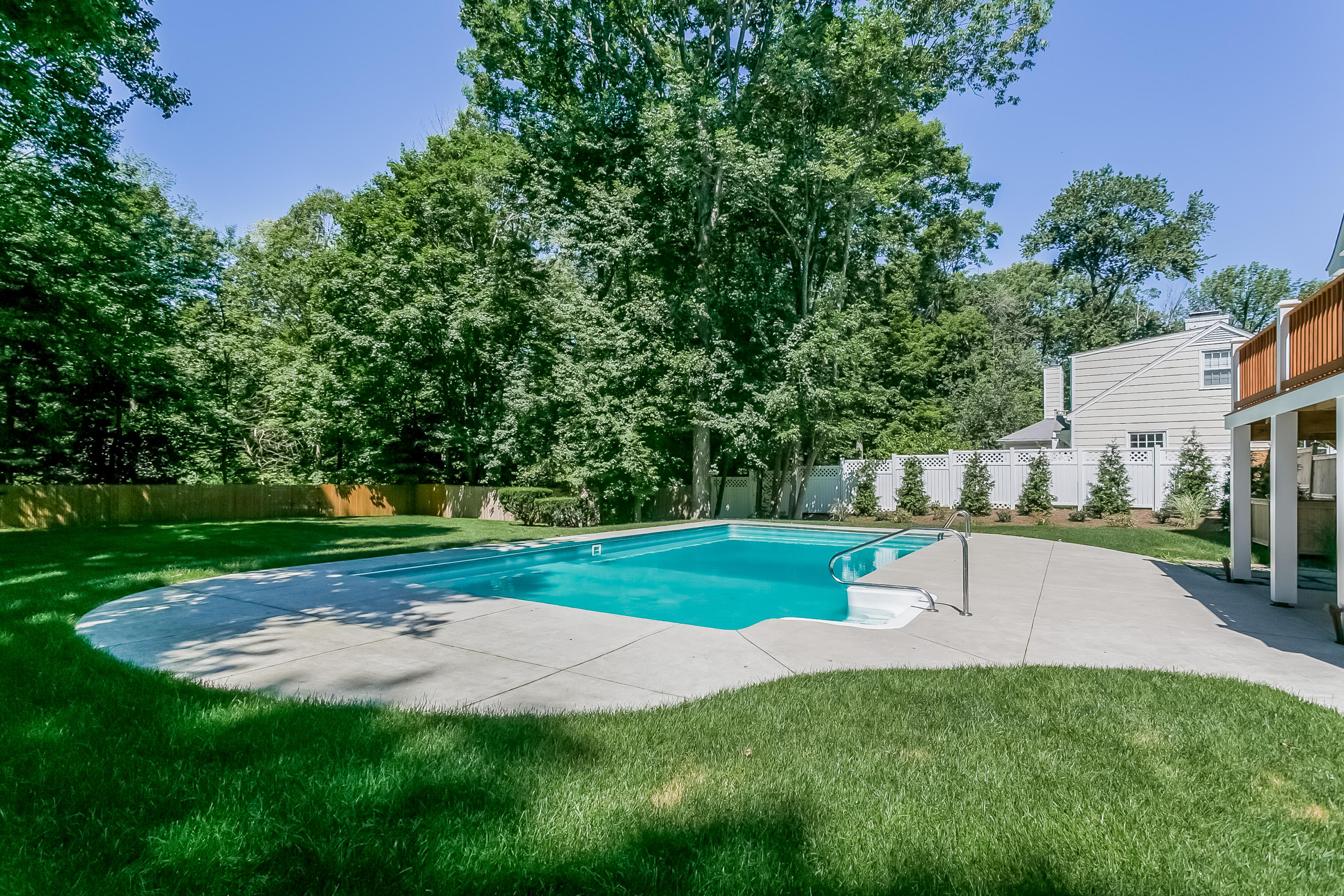 26 Country Club Road Darien, CT 06820 - Photo 6 of 42 a view of a backyard with sitting area