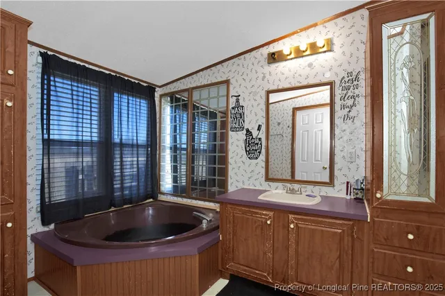 a living room with granite countertop furniture and a large window