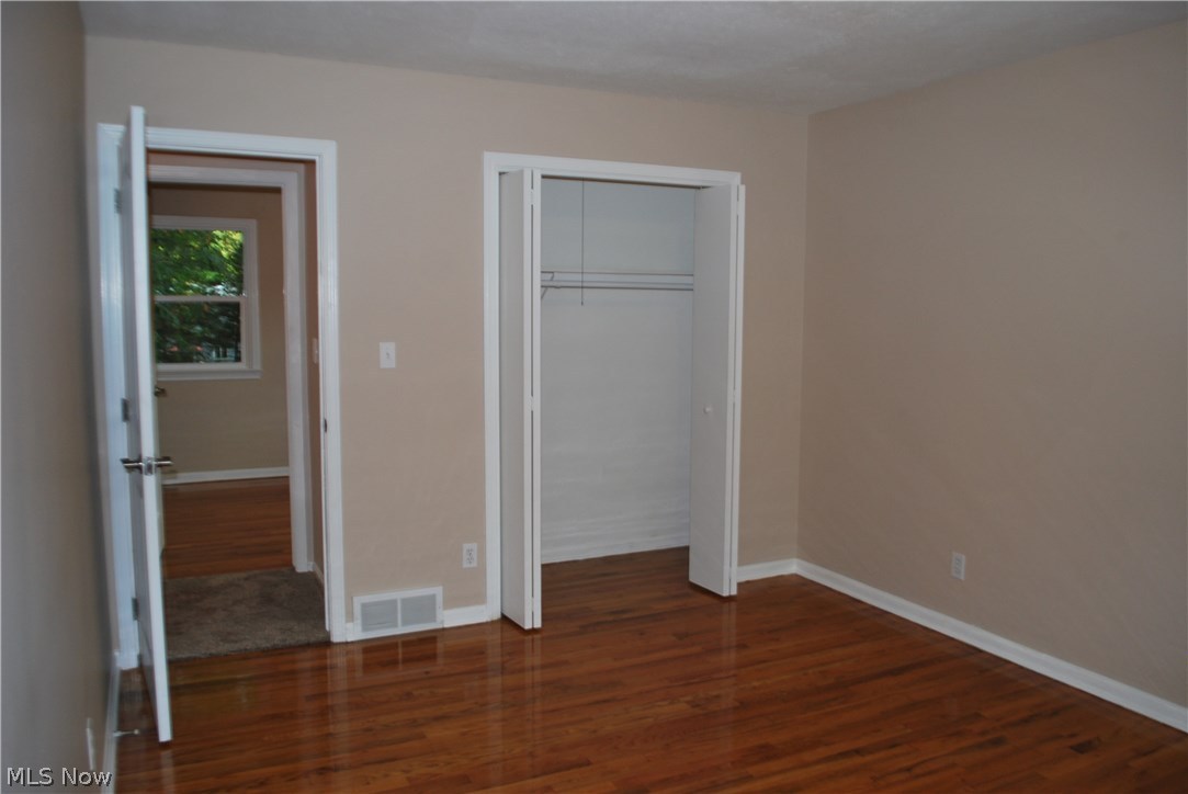 4260 Ridgewood Road Akron, OH 44321 - Photo 28 of 35 Bedroom with hardwood floors.