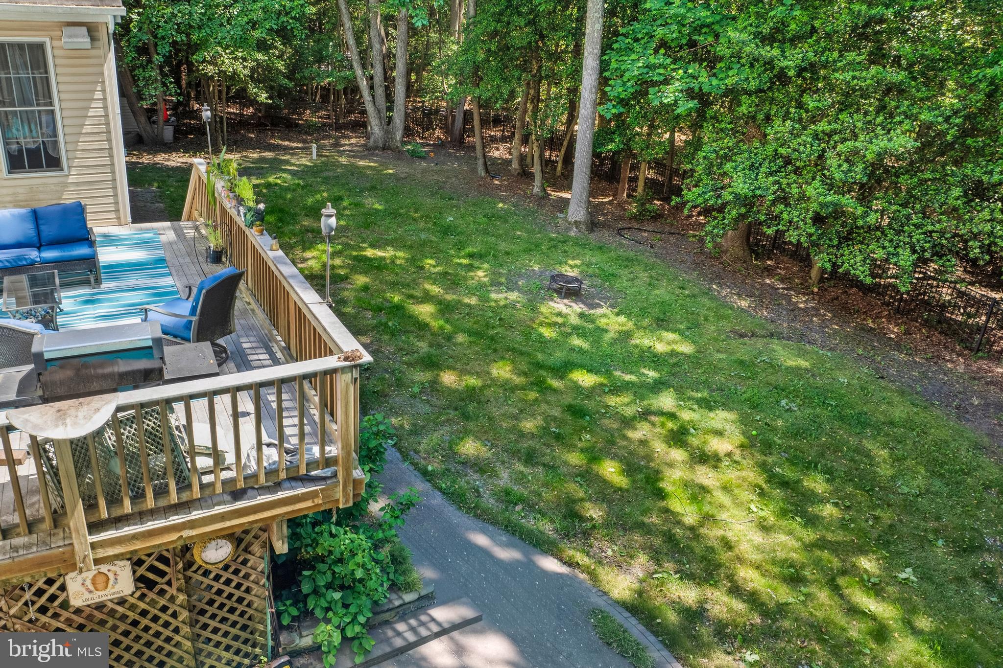 15 Hollybrook Road Mullica Hill, NJ 08062 - Photo 38 of 38 a view of deck with a large window and yard