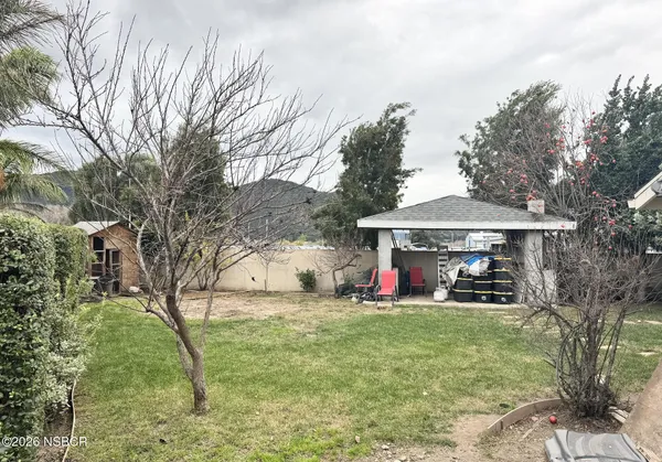 a house with trees in front of it