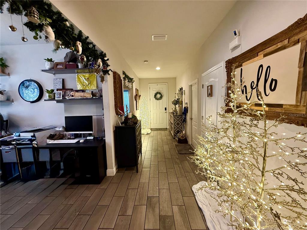 11104 Spring Point Circle Riverview, FL 33579 - Photo 12 of 52 a kitchen with granite countertop a stove and cabinets