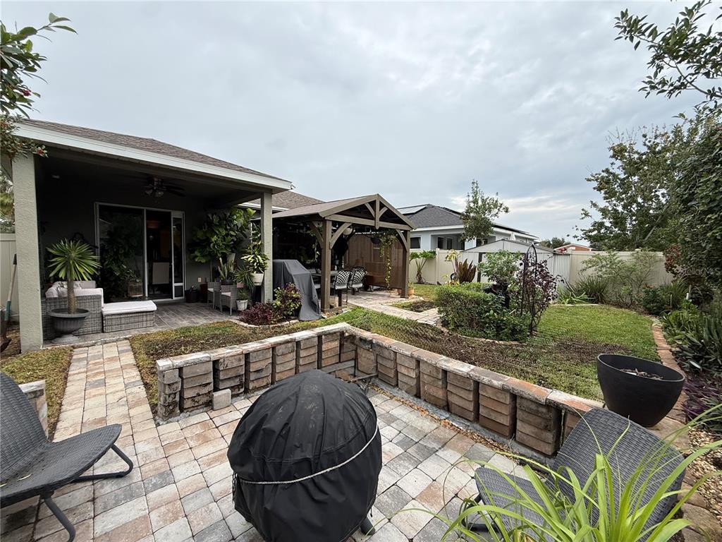 11104 Spring Point Circle Riverview, FL 33579 - Photo 28 of 52 a view of a swimming pool with a patio