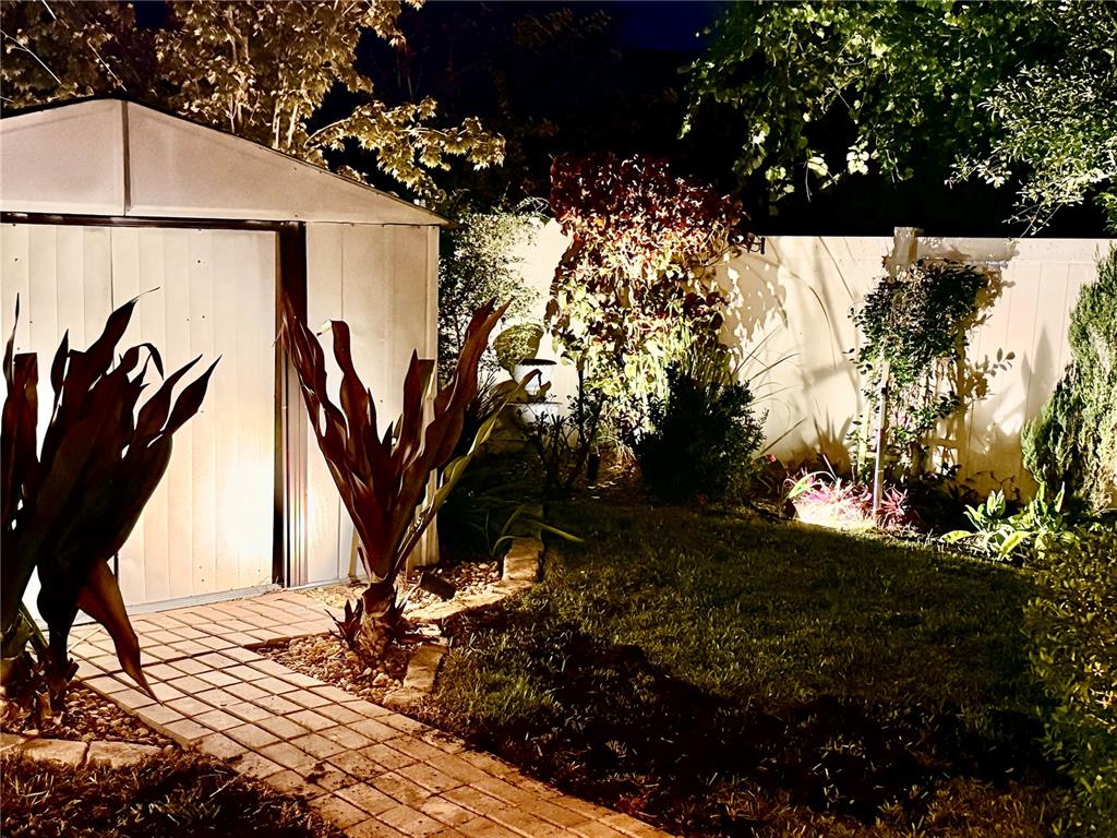 11104 Spring Point Circle Riverview, FL 33579 - Photo 36 of 52 a view of outdoor space with a garden