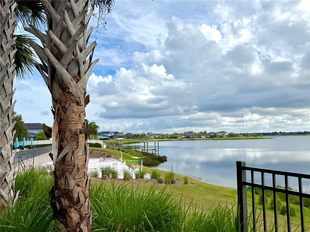 11104 Spring Point Circle Riverview, FL 33579 - Photo 41 of 52 a view of a lake with houses in the background