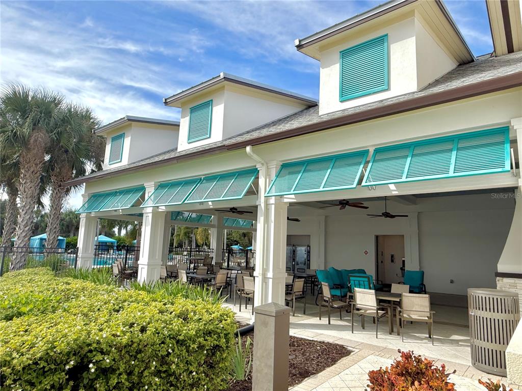 11104 Spring Point Circle Riverview, FL 33579 - Photo 42 of 52 a view of a cafe with sitting area