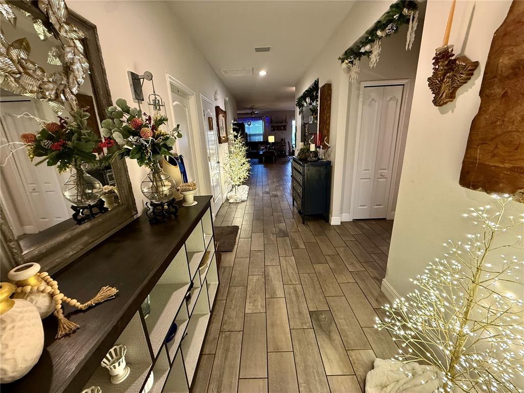 11104 Spring Point Circle Riverview, FL 33579 - Photo 5 of 52 a view of a entryway with wooden floor