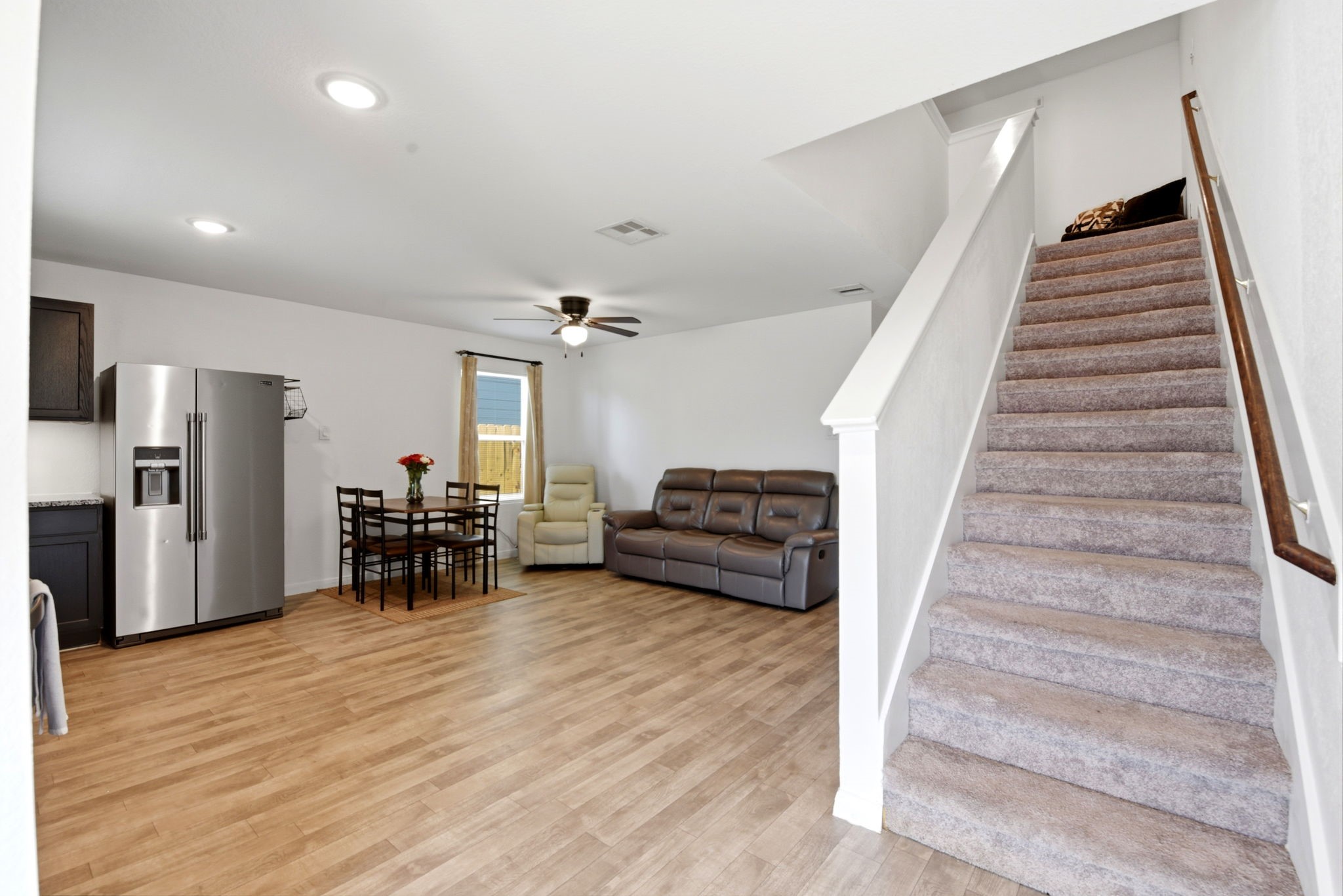 9819 Emerald Stone Way Conroe, TX 77306 - Photo 6 of 38 a view of entryway and hall with wooden floor