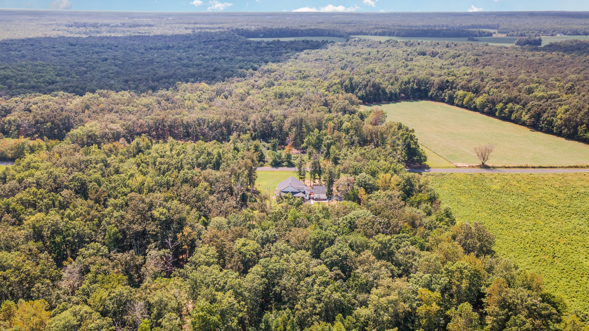 8129 Hollow Springs Road Bradyville, TN 37026 - Photo 12 of 42 a view of a houses with a yard