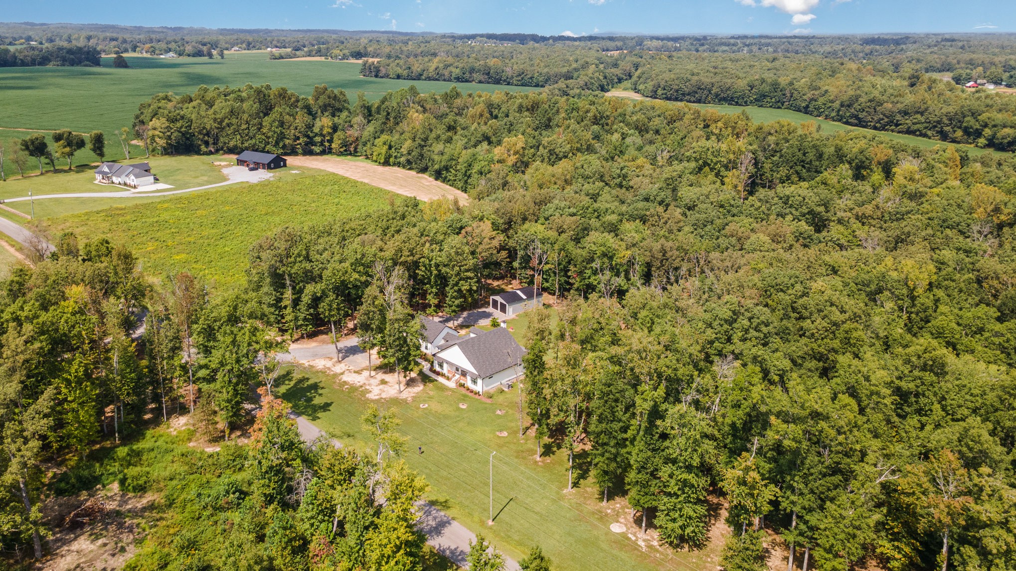 8129 Hollow Springs Road Bradyville, TN 37026 - Photo 13 of 42 a view of a lake with a mountain