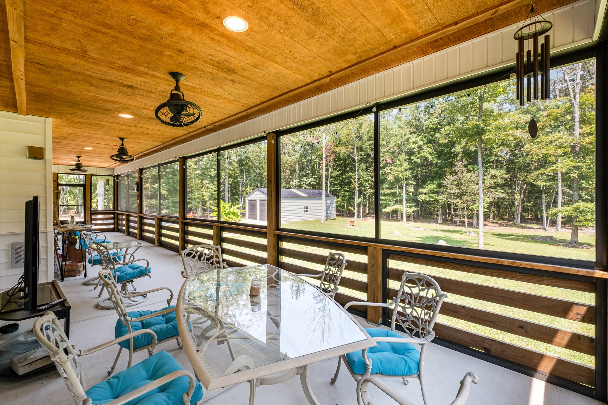 8129 Hollow Springs Road Bradyville, TN 37026 - Photo 15 of 42 a view of a living room and a floor to ceiling window