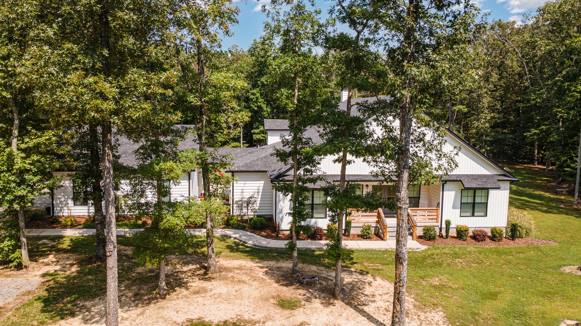 8129 Hollow Springs Road Bradyville, TN 37026 - Photo 17 of 42 a house view with a backyard space