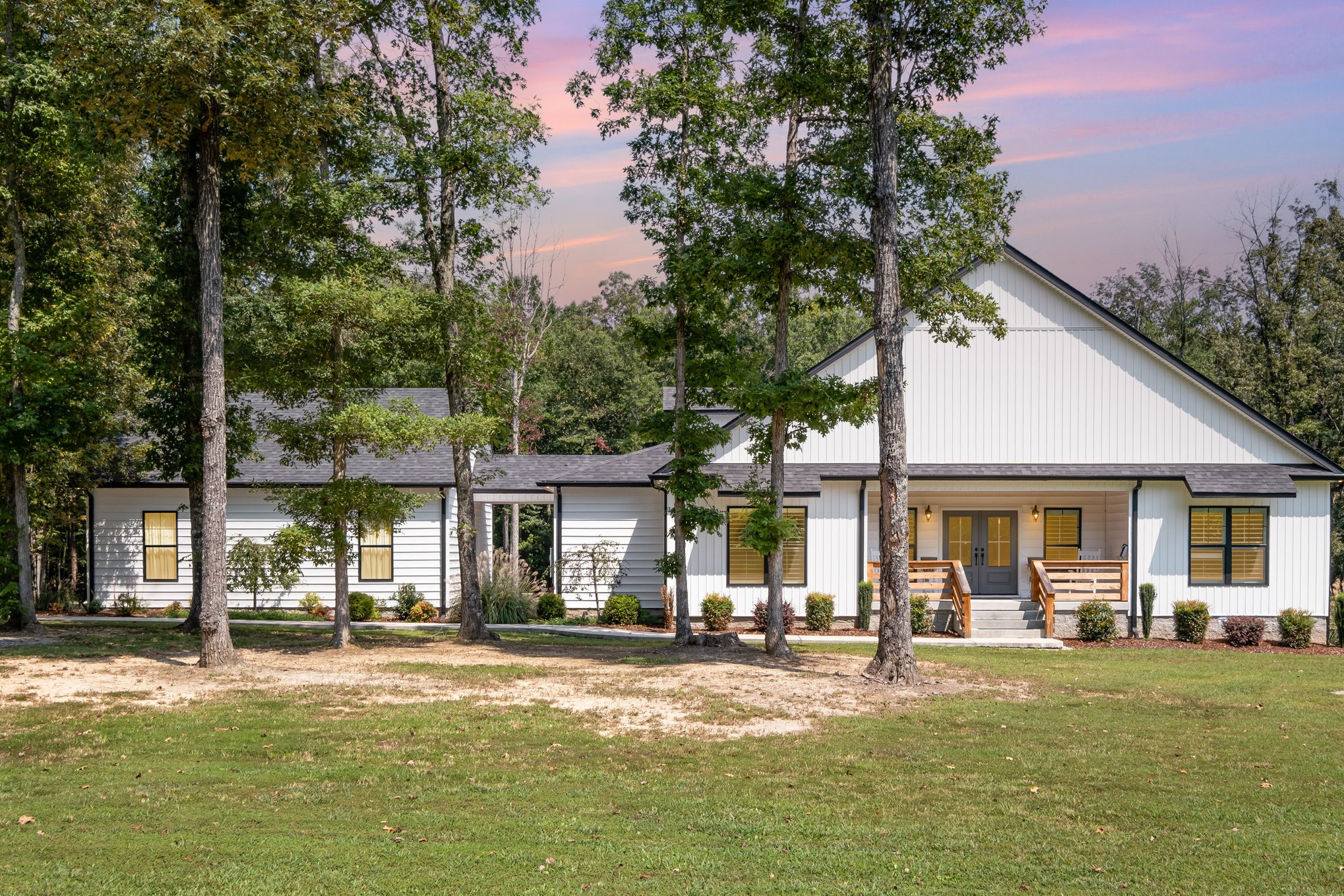 8129 Hollow Springs Road Bradyville, TN 37026 - Photo 2 of 42 a front view of a house with a patio