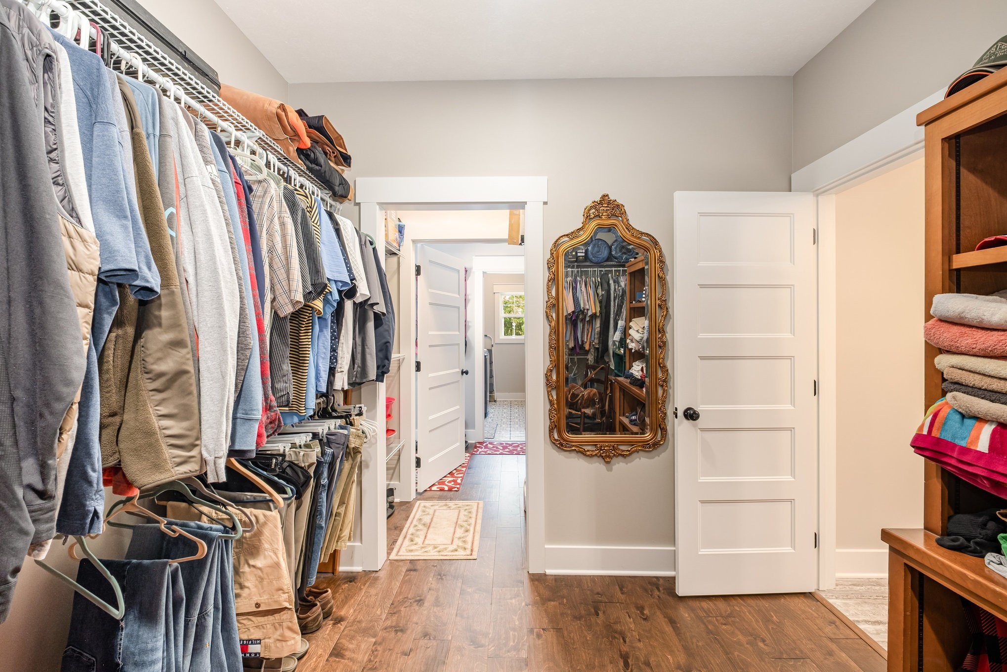 8129 Hollow Springs Road Bradyville, TN 37026 - Photo 25 of 42 a view of walk in closet with clothes and shoes