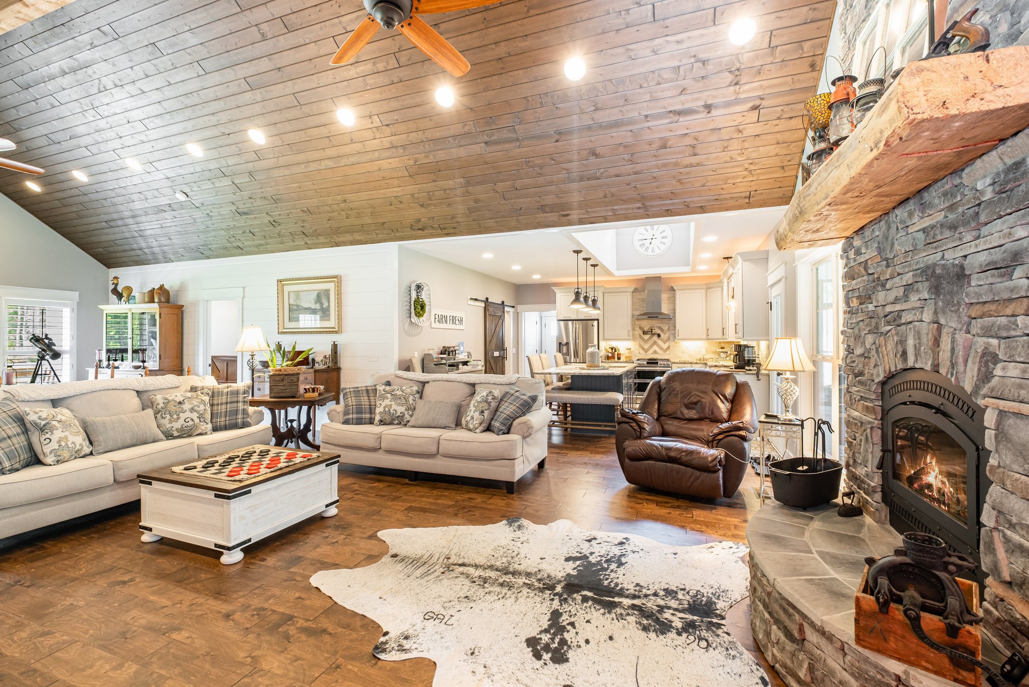 8129 Hollow Springs Road Bradyville, TN 37026 - Photo 35 of 42 a living room with furniture large window and a fireplace