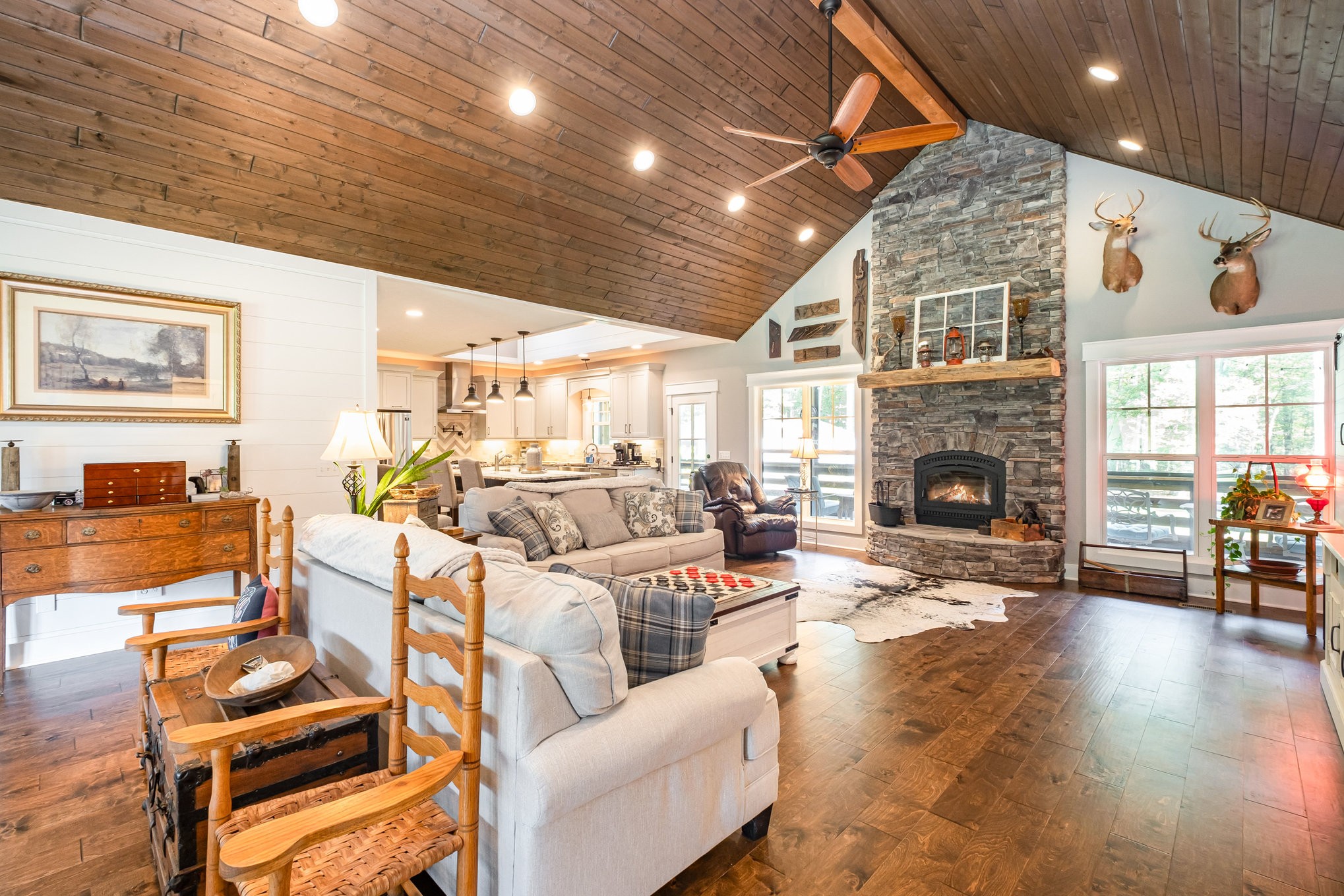 8129 Hollow Springs Road Bradyville, TN 37026 - Photo 36 of 42 a living room with furniture a fireplace and wooden floor