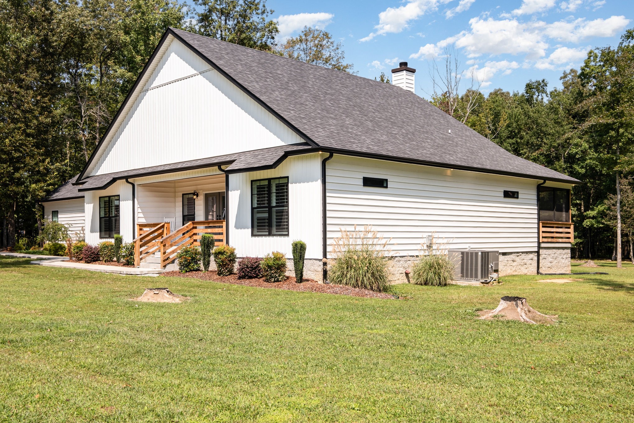 8129 Hollow Springs Road Bradyville, TN 37026 - Photo 4 of 42 a view of a house with a yard