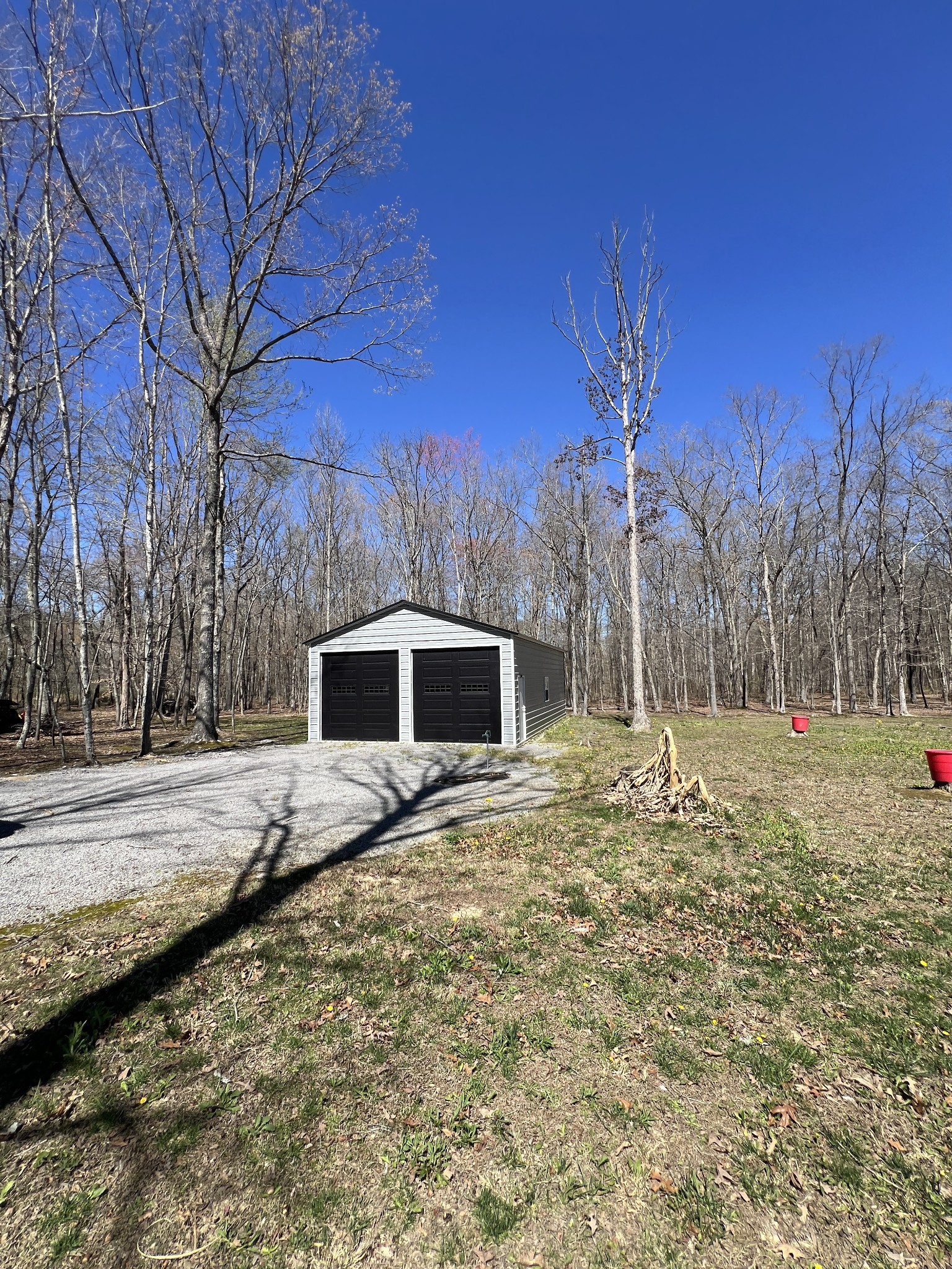 8129 Hollow Springs Road Bradyville, TN 37026 - Photo 42 of 42 a house with trees in front of it